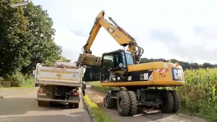 Аренда колесного экскаватора CAT 318D