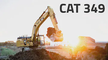 Caterpillar 349 Excavator Loading 740 Trucks