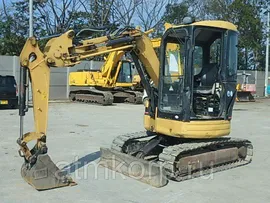 Экскаватор Caterpillar 303