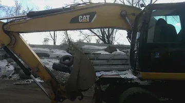 Аренда колесного экскаватора СПБ, CAT 315D