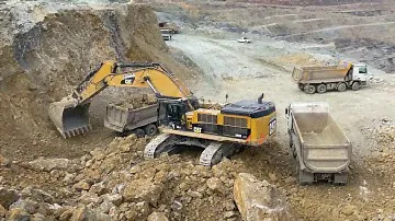 Caterpillar 390D Excavator Loading Trucks - Pyramis Ate