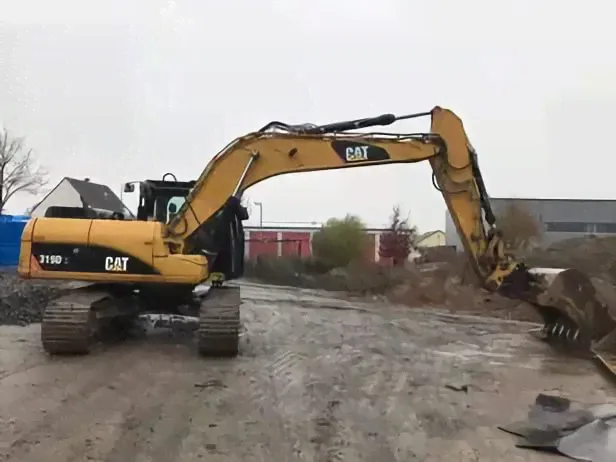 Гусеничный экскаватор Caterpillar 319 DL-0